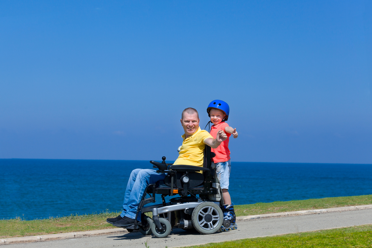 Disabled Father play with his little son