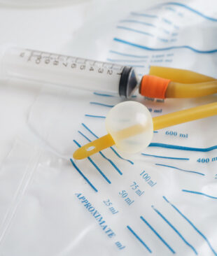 Foley catheter and urine drainage bag collect urine for disability or patient in hospital.